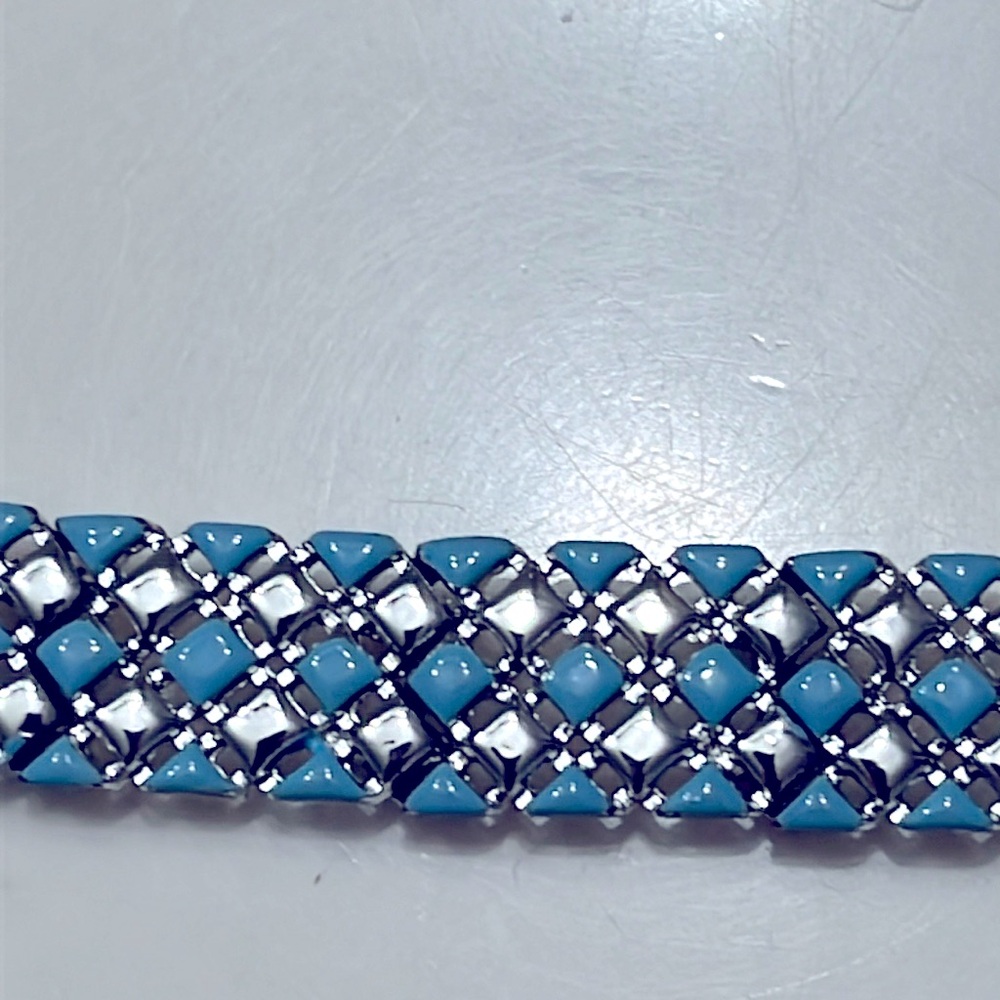 Vintage bracelet. Silver tone w/ blue enamel. Solid. Safety closure. Geometric